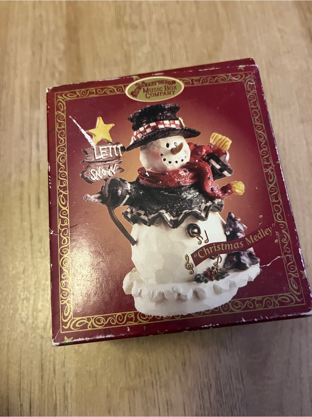 The Music Box Company Red Snowman Holiday Figurine